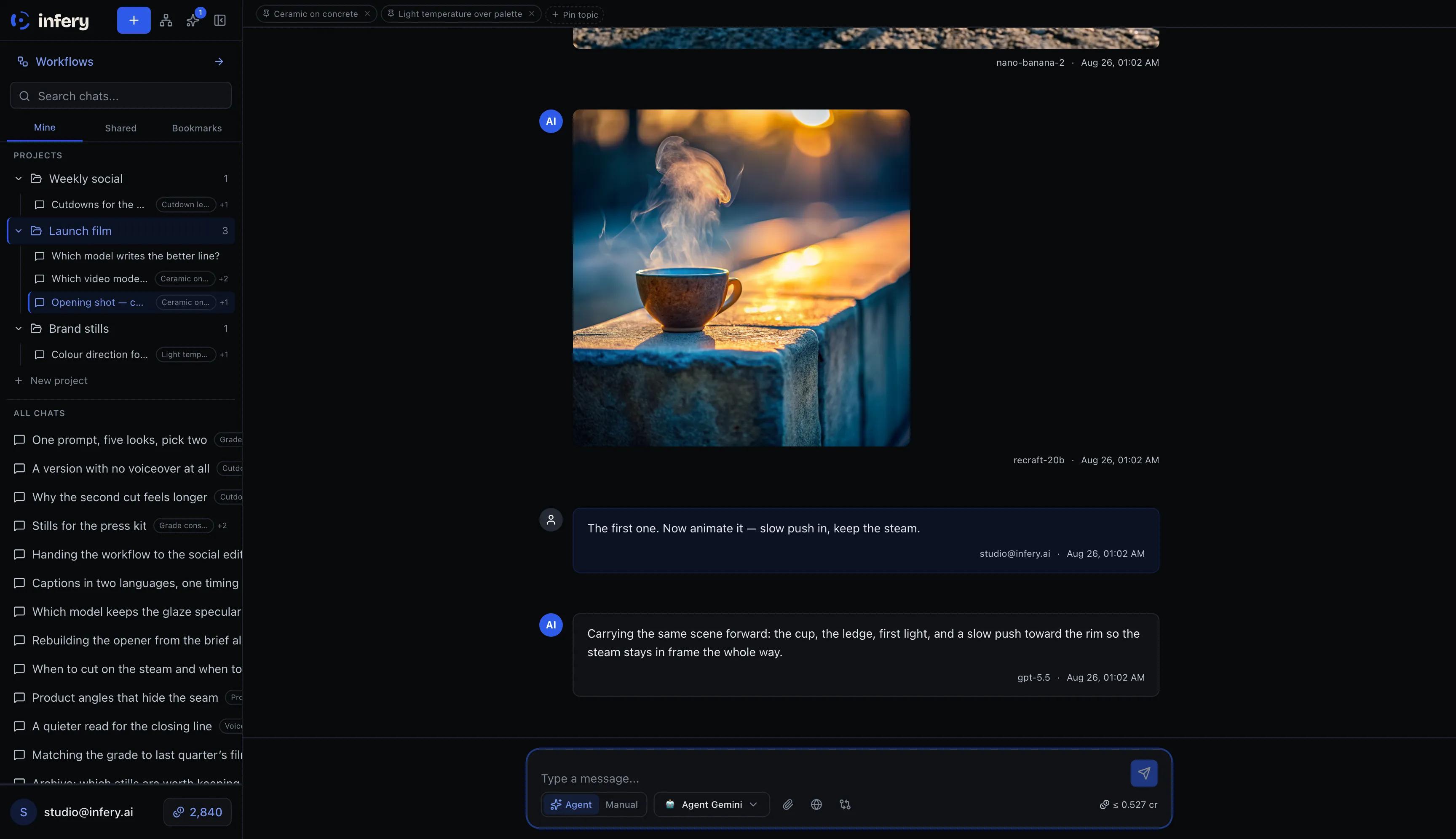The whole Studio: on the left, projects — Weekly social, Launch film, Brand stills — over a list of thirty-one chats and a credit balance; on the right, an open thread under its two topics, holding a generated frame of a cup on a ledge at first light and the exchange that asked for it.